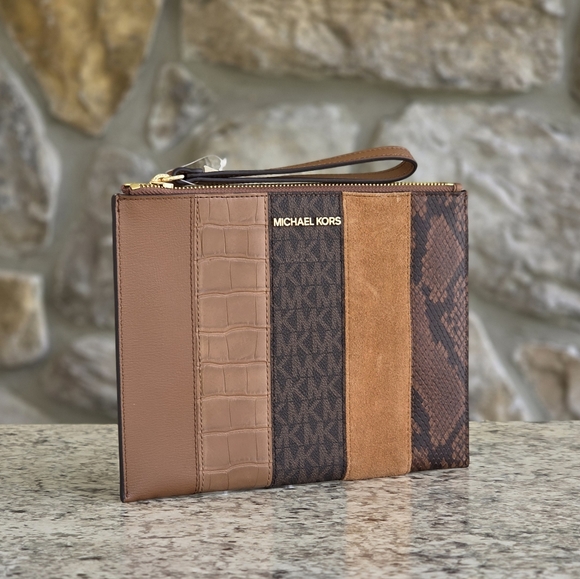 Michael Kors Handbags - Michael Kors Jet Set Extra Large Brown Clutch Wristlet